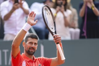 Novak Djokovic a remporté son 100e titre samedi à Genève KEYSTONE/MARTIAL TREZZINI